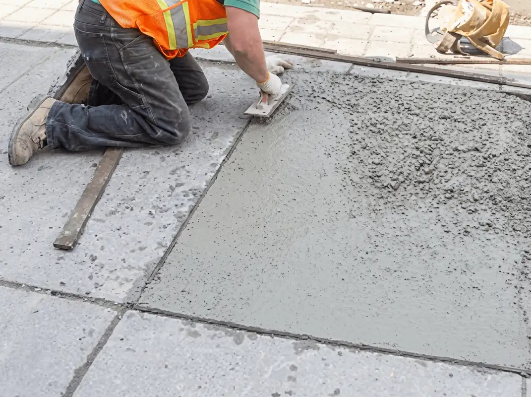 Professional repairing a concrete floor in Chandler, AZ